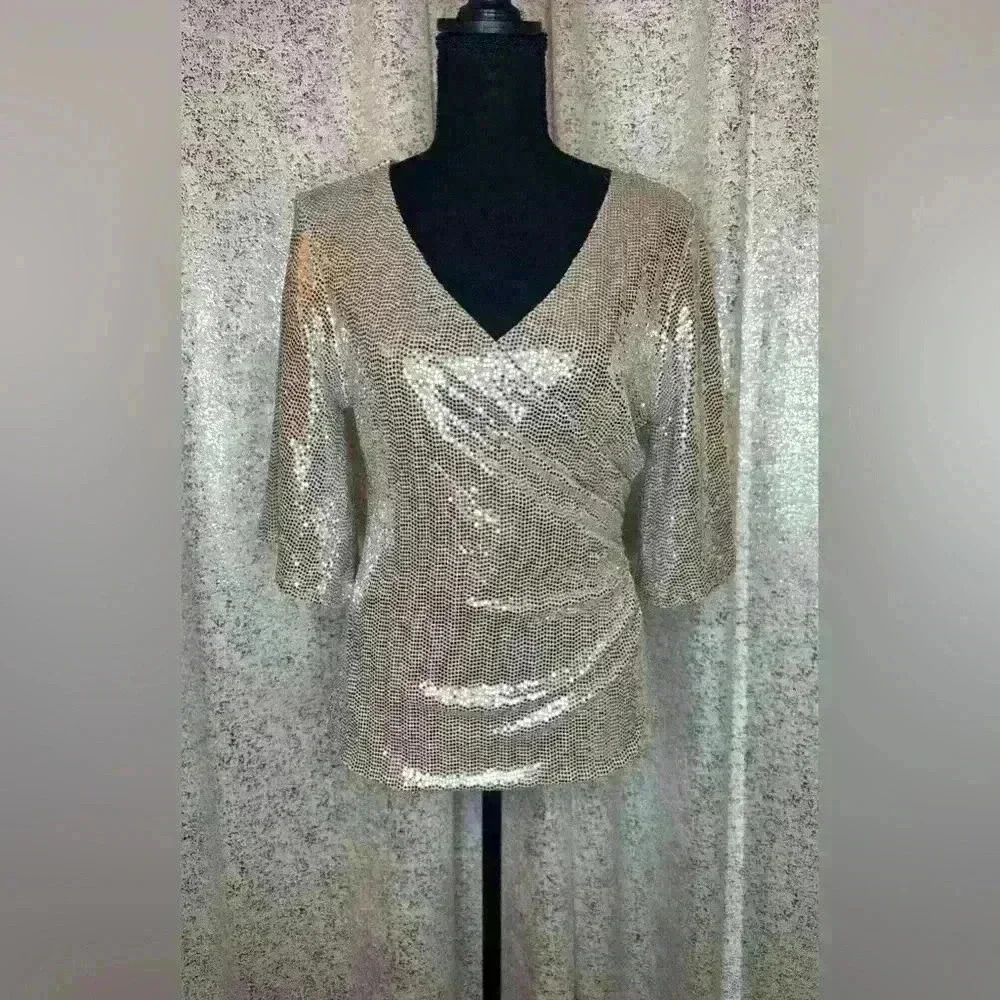 Never worn silver sequined blouse